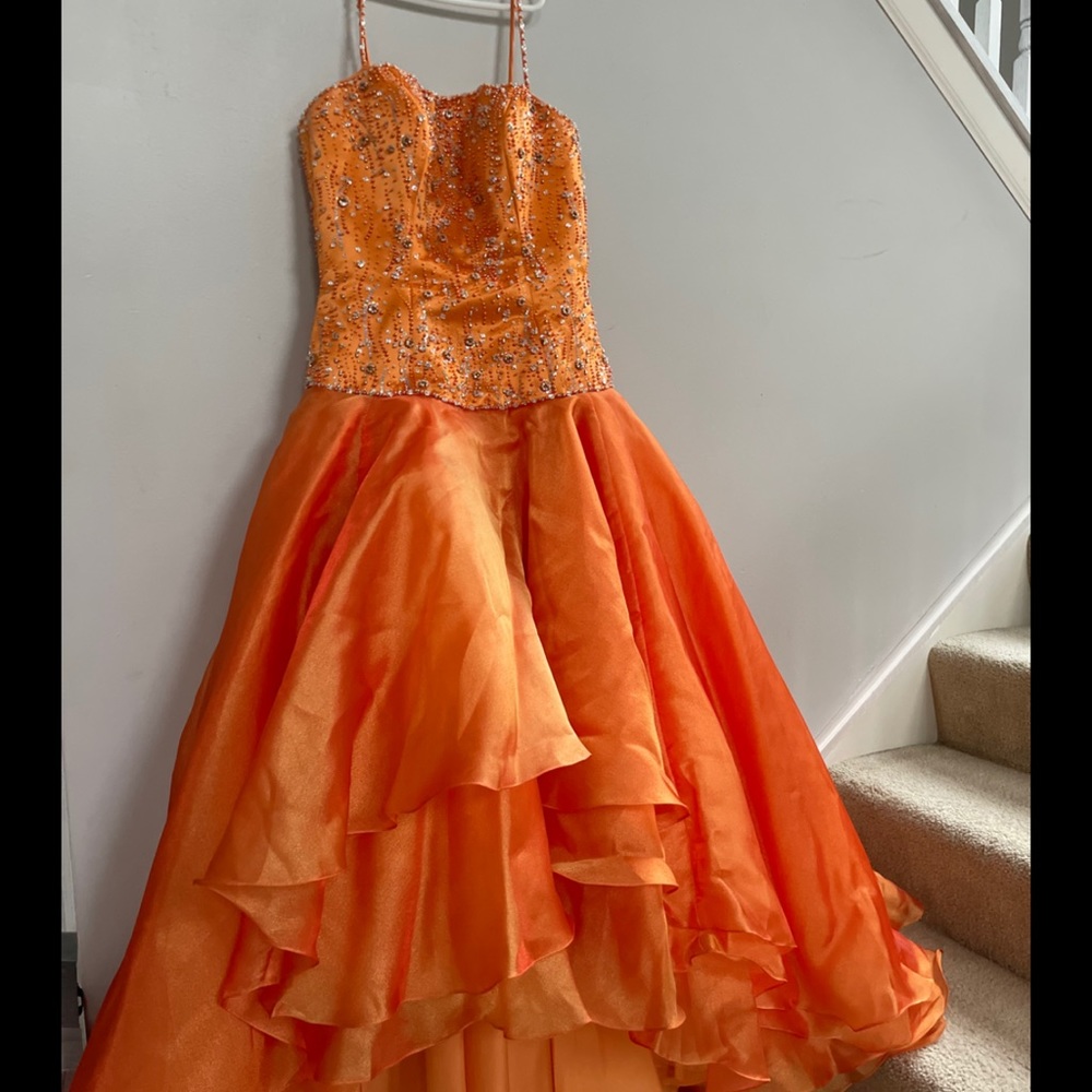 Mary’s Orange gown
